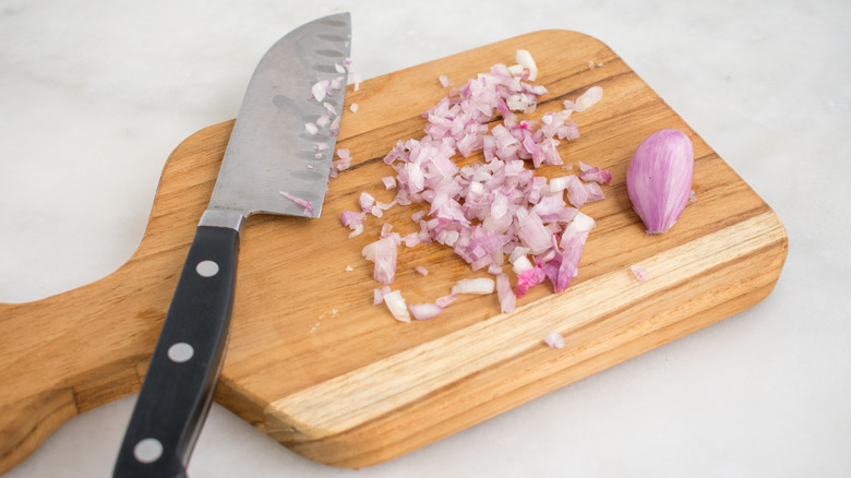 chopped shallot on cutting board