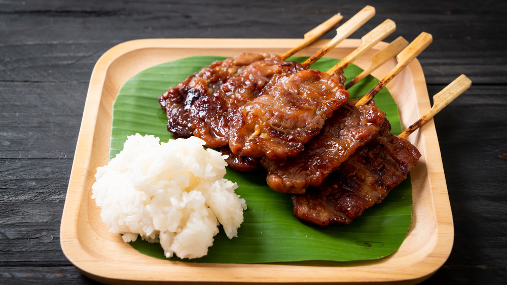 Pork skewers with sticky rice