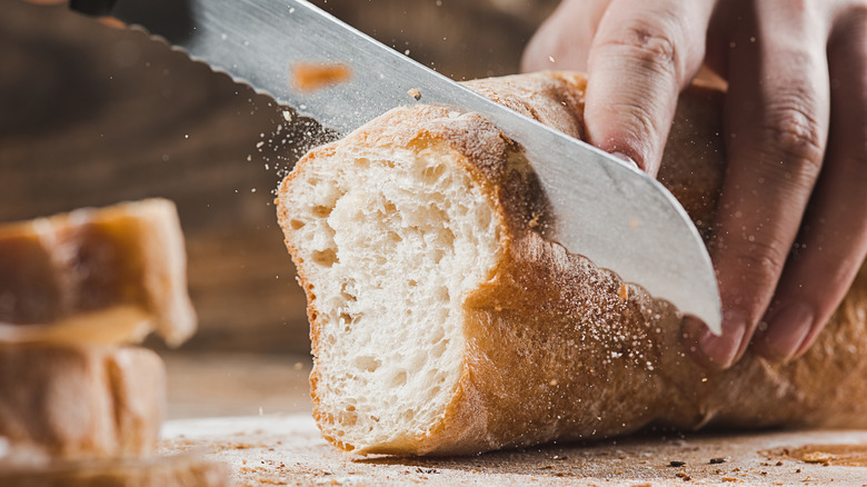 slicing bread with knife