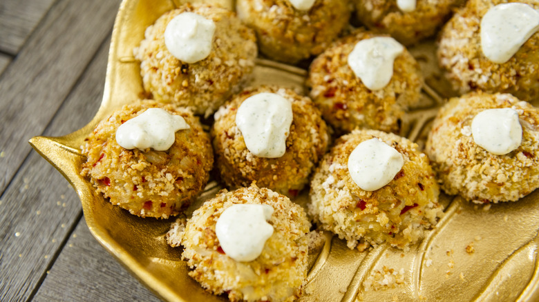 mini crab cakes with dollop of sauce