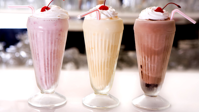 strawberry, vanilla, and chocolate milkshakes