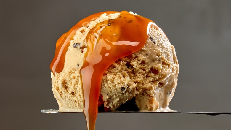 caramel sauce on scoop of ice cream