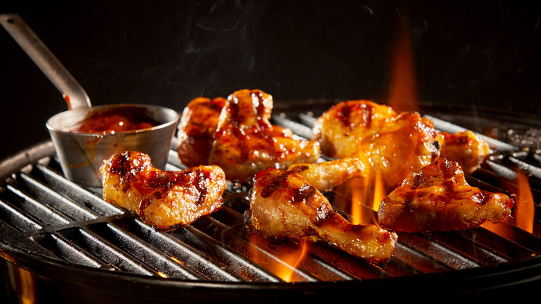 Marinated chicken wings on a grill