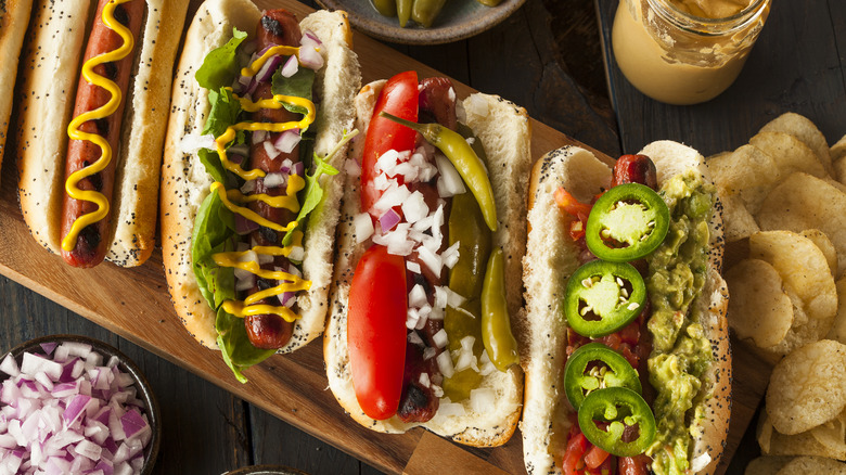 hot dogs with different toppings 