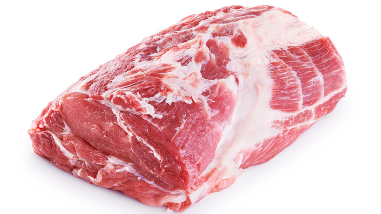 fresh raw fatty pork on white background