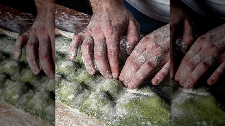 person making ravioli