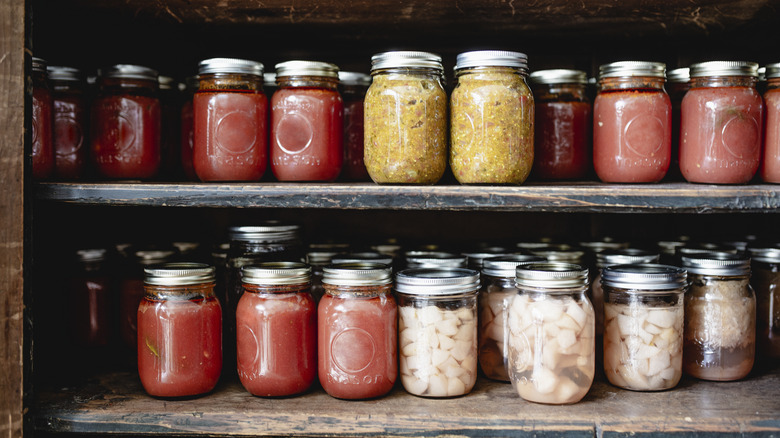 shelf of filled mason jars 