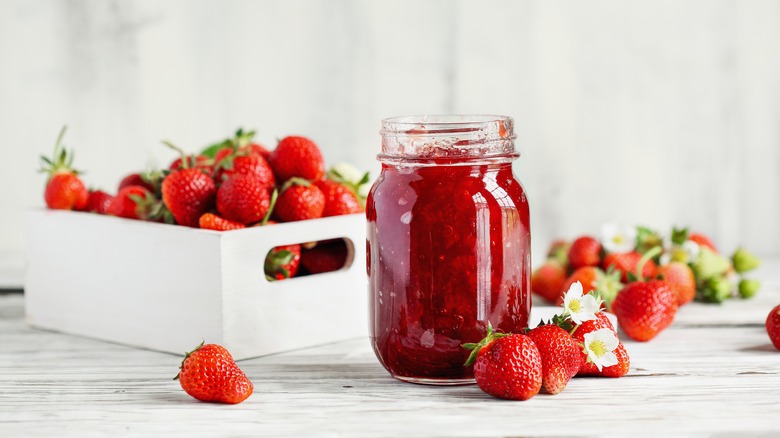 strawberry jam jar and fruit