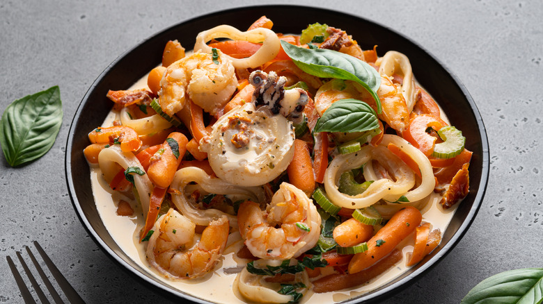 Creamy seafood stew with calamari