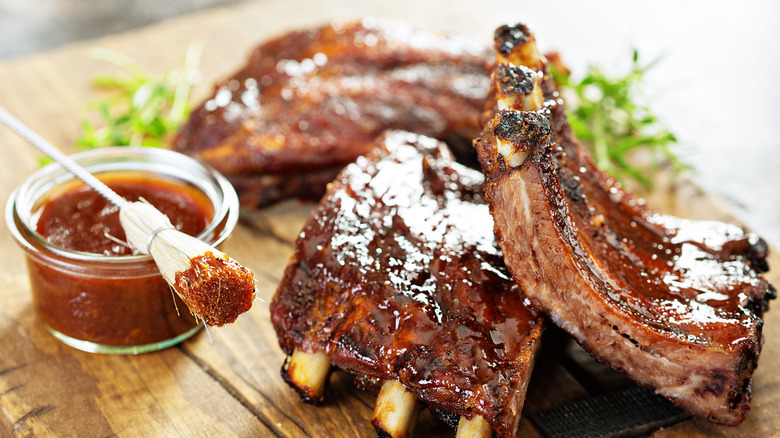 Rack of ribs on wooden board