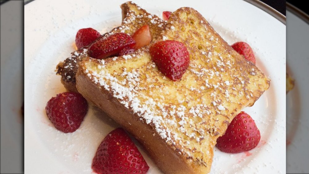 French toast with powdered sugar and strawberries