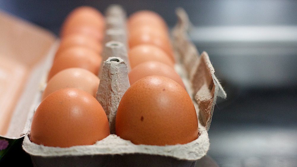 A dozen eggs in paperboard carton for French toast