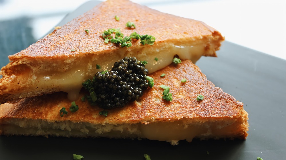 upscale grilled cheese sandwich with caviar and hearbs