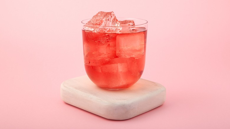pink cocktail on coaster