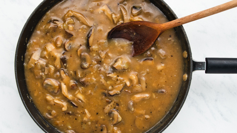 mushroom gravy in frying pan