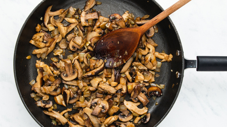 mushrooms and onions in pan