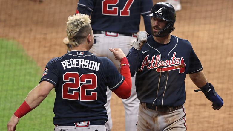 Joc Pederson & Dansby Swanson on the field