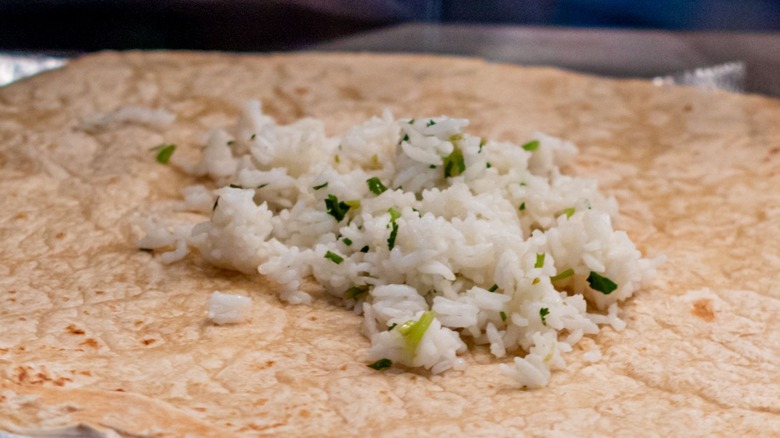 Chipotle cilantro rice on tortilla