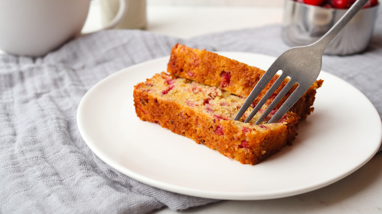 plate of sliced cranberry bread