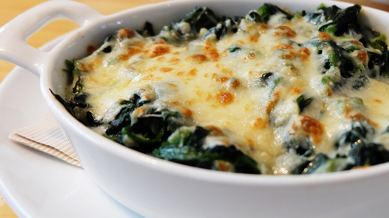 spinach with cheese in a baking dish