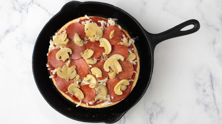 pepperoni and mushrooms on pizza