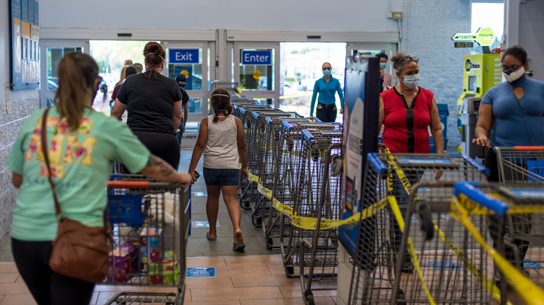 People at a busy Walmart