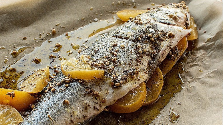 close up of fish on sheet tray