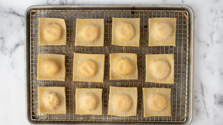 drained ravioli on wire rack