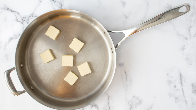 butter in skillet