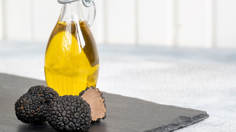 bottle of truffle oil and truffles