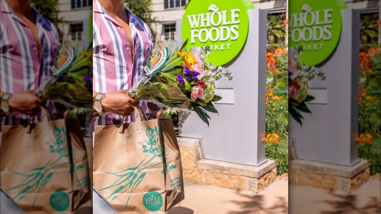 Whole Foods shopper with flowers