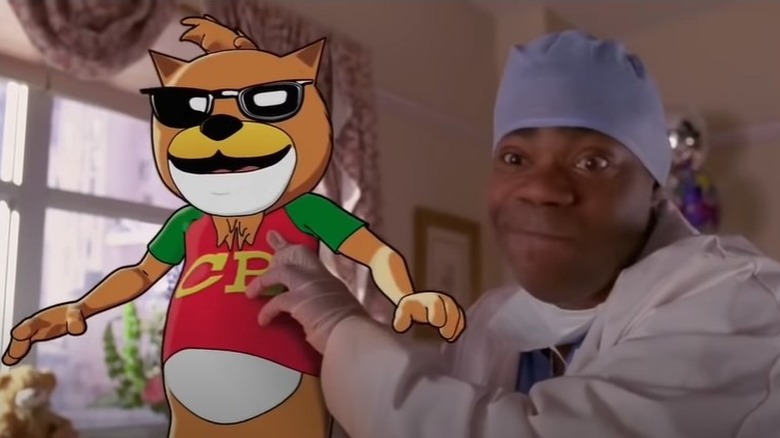 Tracy Morgan holding cheesy blaster mascot on 30 Rock