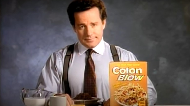 Phil Hartman smirking in commercial parody on SNL