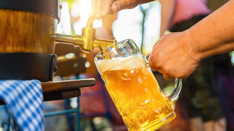 Beer keg with beer stein