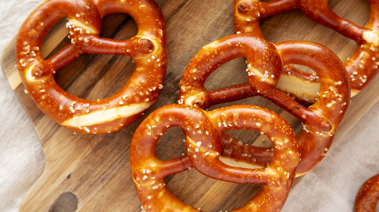 Homemade soft pretzels on a wooden board