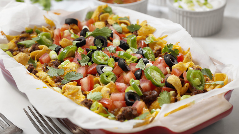 Taco dip in a casserole dish