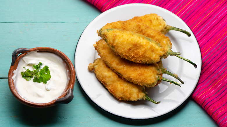 Jalapeño poppers on white plate