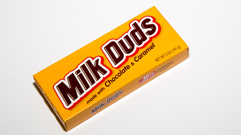 tilted yellow milk duds box