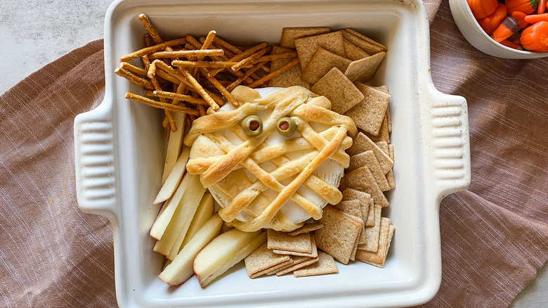 Brie mummy with Halloween candies