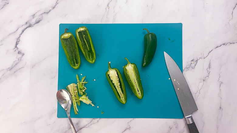 jalapeños with knife