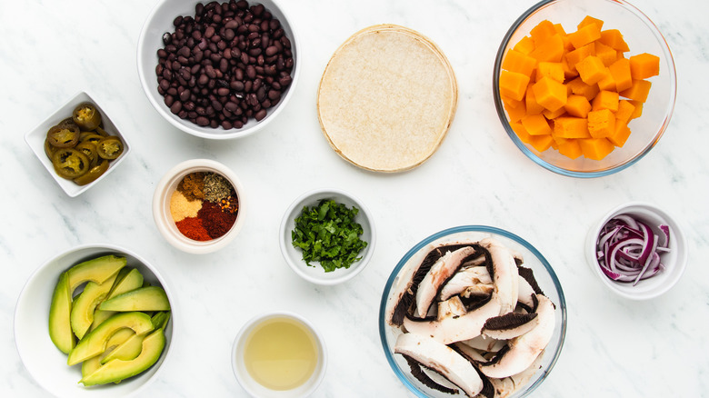 Taco ingredients in bowls