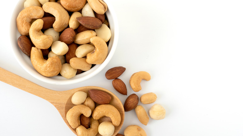 nuts in bowl with spoon