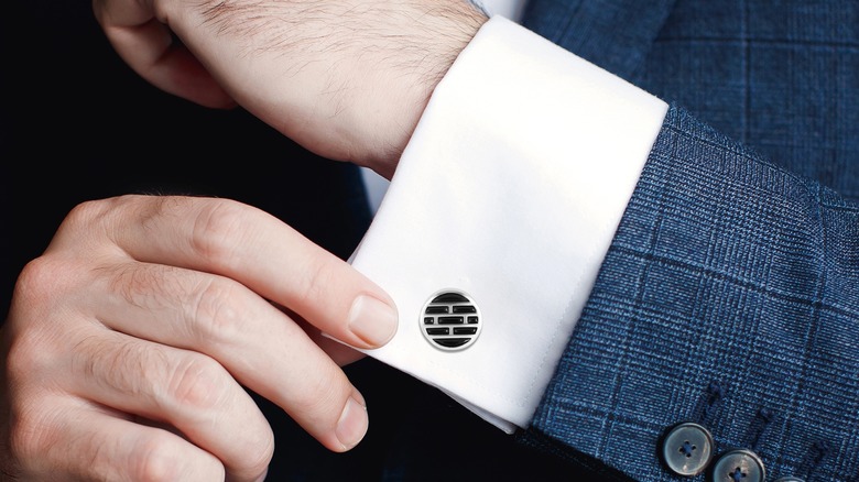 close up cufflinks and shirt