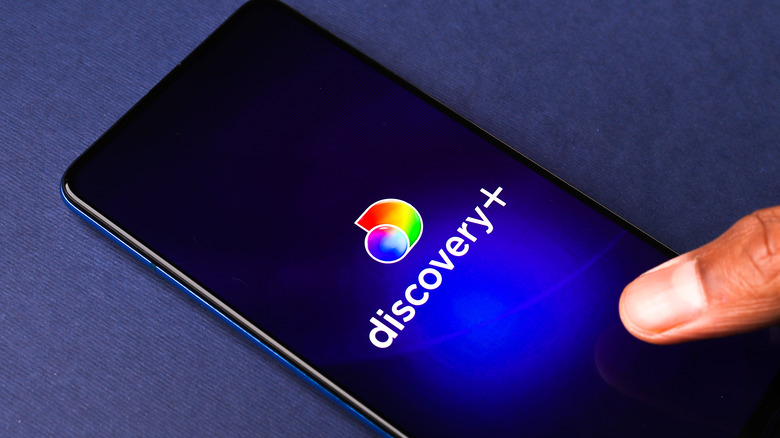 Discovery+ app logo on phone