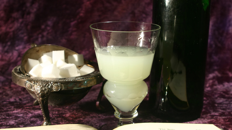 green absinthe and sugar cubes