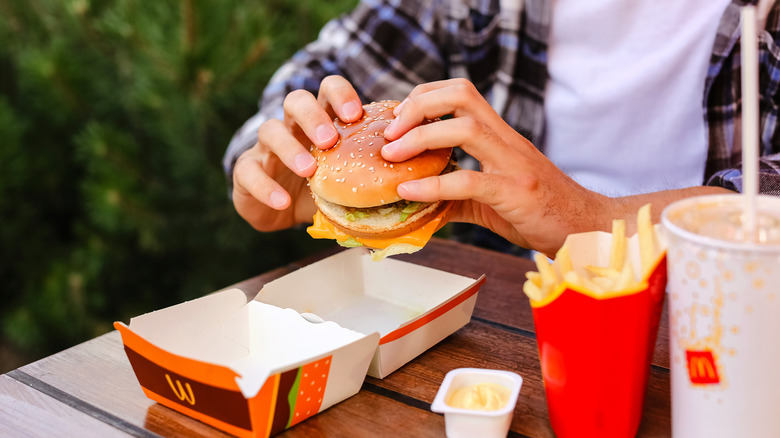 Man eating McDonald's