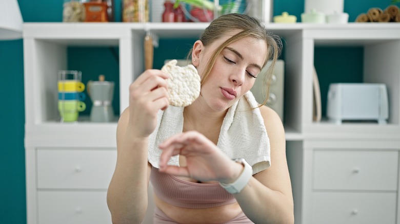 Woman eating a rice cake