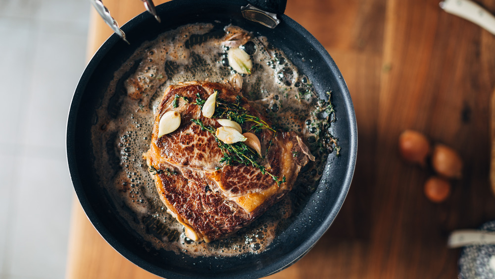 Meat browning in metal pan