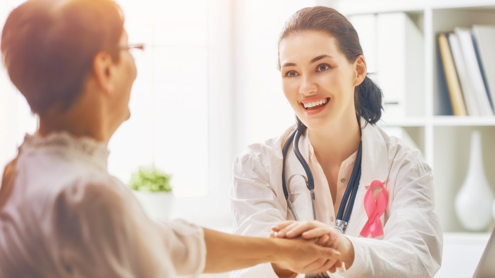 Doctor and breast cancer patient