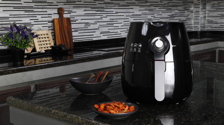 air fryer on a dark table